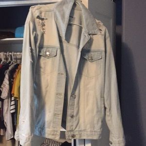 Ripped denim jacket